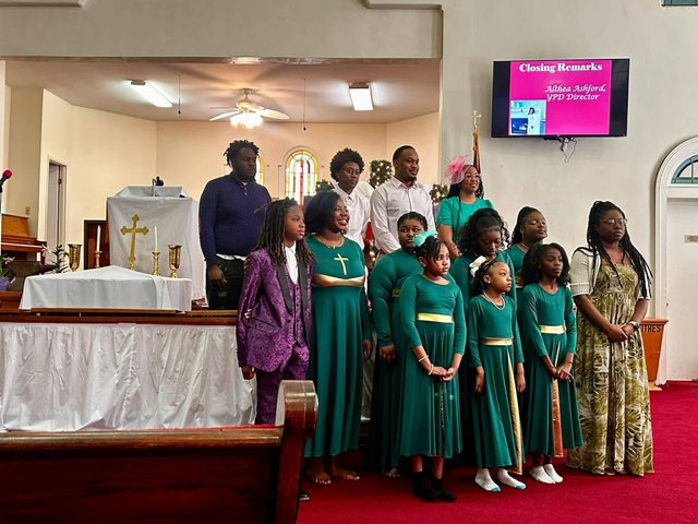 Youth and young adults of St. Luke AME Church performing during a church service